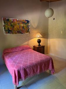 En eller flere senge i et værelse på Casa de campo