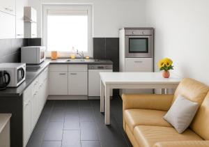 Køkken eller tekøkken på Hotelikum Zentral Günstig