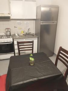 Køkken eller tekøkken på Moderno departamento en pleno centro de Río Cuarto + 1 billede