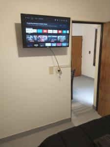 Et tv og/eller underholdning på Moderno departamento en pleno centro de Río Cuarto