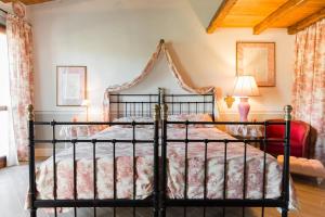 Postel nebo postele na pokoji v ubytování Casa Il Borghetto - Luxury Suites & Pool