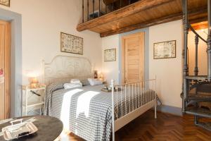 Postel nebo postele na pokoji v ubytování Casa Il Borghetto - Luxury Suites & Pool