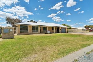 a house with a lawn in front of it at Salt and Sand Escape in Lancelin