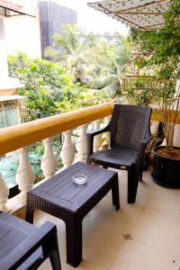En balkon eller terrasse på RR Haus Candolim 2BHK Near Hyatt Centric