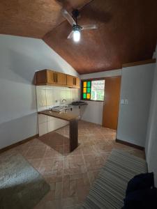 Køkken eller tekøkken på Suítes Ventos do Mar + 18 billeder