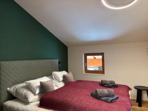 Postel nebo postele na pokoji v ubytování Zug503 Appartement in Lech am Arlberg