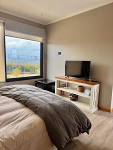 TV a/nebo společenská místnost v ubytování Casa en Maitencillo