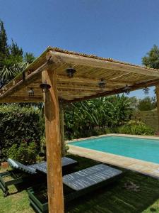 Swimmingpoolen hos eller tæt på Estancia Urbana Casa de Huéspedes