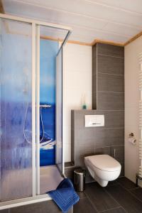 Phòng tắm tại Ferienwohnungen Panoramablick - NEU incl 3-WeltenCard mit 140 kostenlosen Attraktionen +50 ảnh