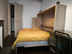 Giường trong phòng chung tại Cocon pyrénéen