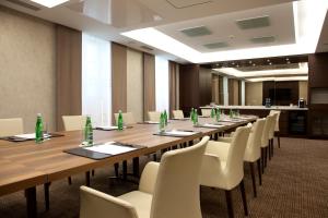 a large conference room with a long table and chairs at Mamaison Le Regina Boutique Hotel in Warsaw +83 photos