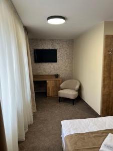 TV a/nebo společenská místnost v ubytování Alen Mak