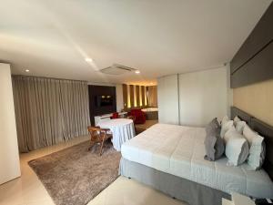 En eller flere senge i et værelse på Pumma Business Hotel + 43 billeder