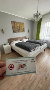 En eller flere senge i et værelse på Pension "Am Markt" + 39 billeder