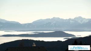 a view of a valley with mountains in the distance at Haus Karoline FeWo5 in Hochrindl