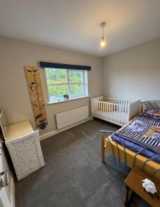 En eller flere senge i et værelse på Lighthouseview - Cahersiveen