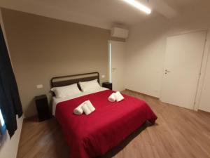 Llit o llits en una habitació de Hello Parma