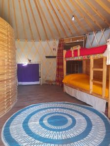 En eller flere senge i et værelse på Traslasierra Nono Balneario paso de las tropas