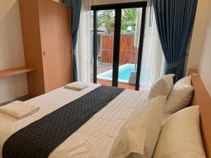 Giường trong phòng chung tại Luxury Boutique Pool Villa Ao Nang Krabi +30 ảnh