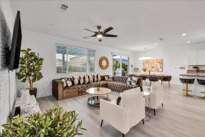 a living room with a couch and a table at Oh la la Coachella in Coachella