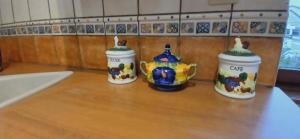 three small vases sitting on top of a table at Entre sel et vignes in Lons-le-Saunier +25 photos