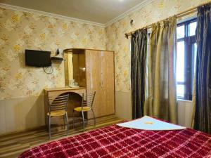 Et tv og/eller underholdning på Assad Resorts