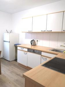 Nhà bếp/bếp nhỏ tại Burgweg Living +6 ảnh