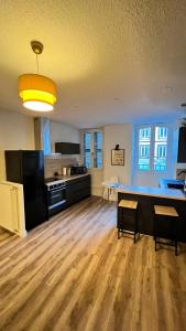Kuchyň nebo kuchyňský kout v ubytování Résidence Jaude - Appartements Cosy en centre ville