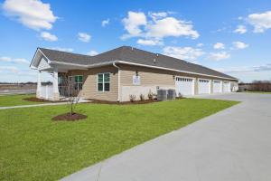a house with a driveway in front of it at Landing Beautiful 1BD in North Fort Worth in Fort Worth
