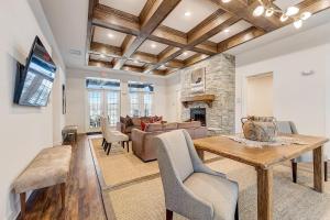 a living room with a table and a couch at Landing Beautiful 1BD in North Fort Worth in Fort Worth