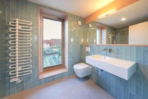 Et badeværelse på Ferienhaus Weitsicht + 71 billeder