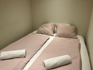 En eller flere senge i et værelse på Urlaub in Alberschwende