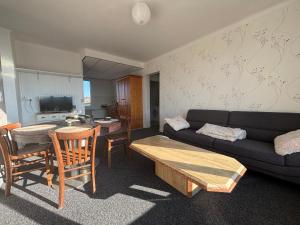 Posezení v ubytování Appartement F4 meublé 75m2 trois chambres avec balcon