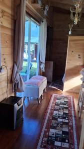 En eller flere senge i et værelse på Cabaña del campo