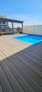 Bazén v ubytování Edificio San Juan de Buenos Aires. nebo v jeho okolí