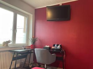 Et tv og/eller underholdning på Chambre rénovée dans appartement de 70m2