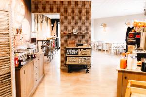 Kuchyň nebo kuchyňský kout v ubytování Logis- Hôtel de la Baie de Wissant & Appartements