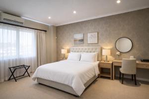 Postel nebo postele na pokoji v ubytování Delphine B&B