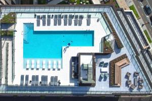 an overhead view of a building with a swimming pool at The View - Navy Yard Washington DC in Washington, D.C.