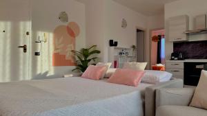 En eller flere senge i et værelse på idromassaggio 5 stelle 3 bed Barbecue Parking