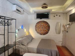 En eller flere senge i et værelse på Imbassaí Pousada Hostel Lujimba + 95 billeder