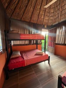 En eller flere senge i et værelse på Casa Nawara