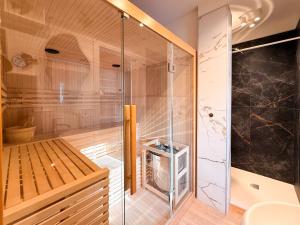 a shower with a glass door in a bathroom at FORTUNA ORO in montagna in Spormaggiore +65 photos