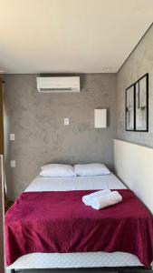 En eller flere senge i et værelse på Prazeres do Rosa