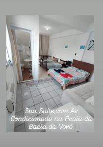 En eller flere senge i et værelse på Suite Penha Beto Carrero World