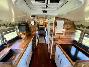an interior view of a kitchen in an rv at Camp Bonnie in Kent