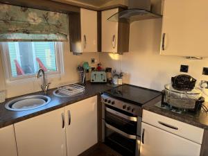 Nhà bếp/bếp nhỏ tại Turnberry Holiday Park