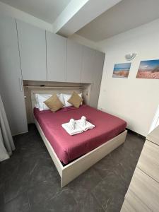 En eller flere senge i et værelse på Little House