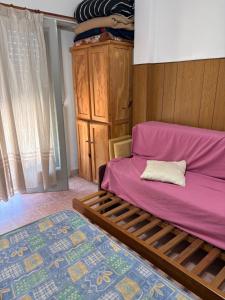 Postel nebo postele na pokoji v ubytování Monoambiente