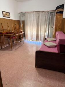 Postel nebo postele na pokoji v ubytování Monoambiente